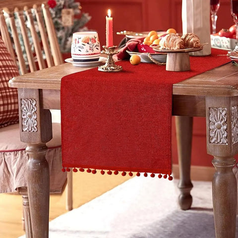 SevenFish Christmas table runner in red burlap adds rustic holiday charm