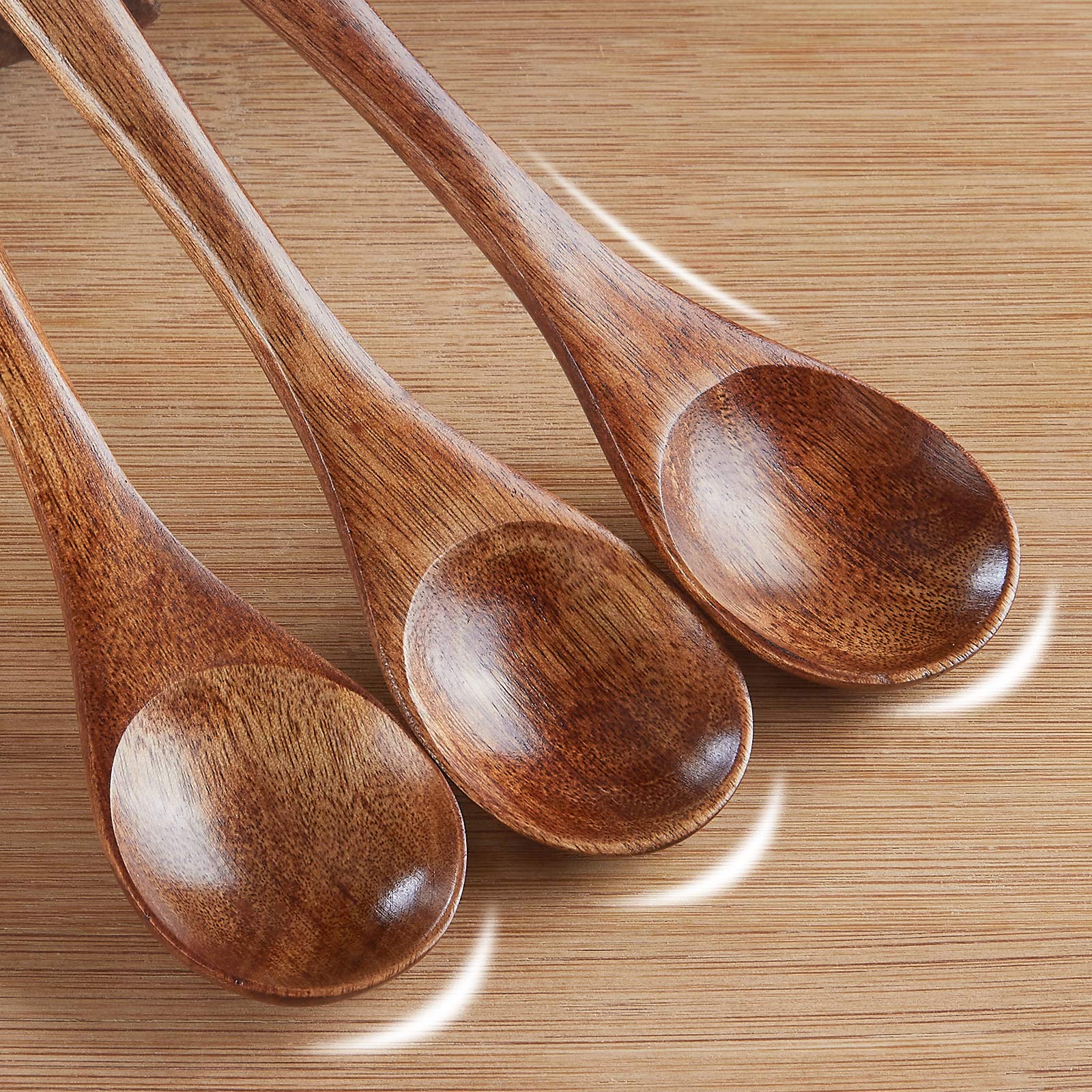Sevensun wooden spoon dipping honey highlighting natural grain