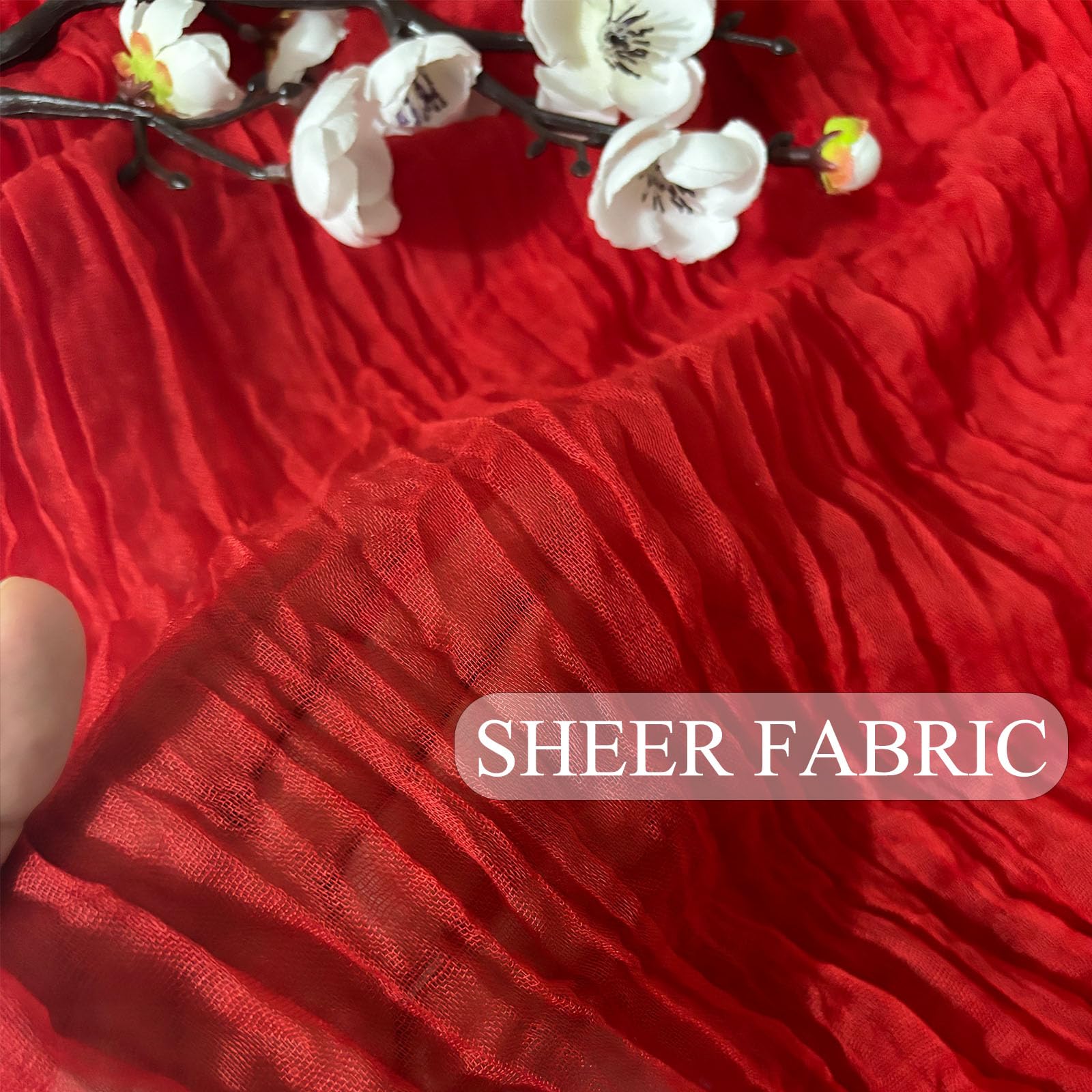 Seveups wedding reception backdrop using cheesecloth red runner