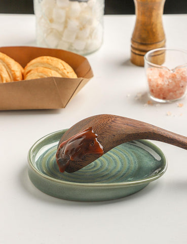 Versatile use includes soap dish or small jewelry tray when not cooking.