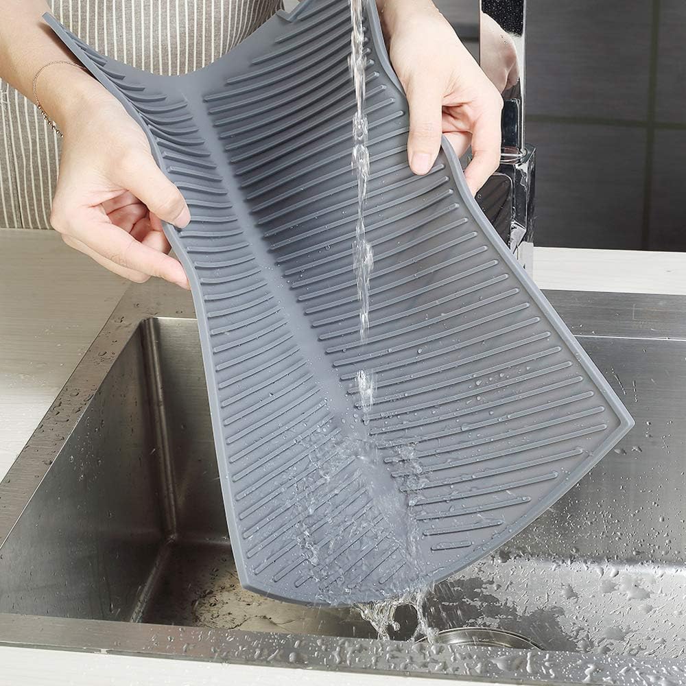 SFBBCLOZ gray drying mat sits beside the dishwasher for practical use.