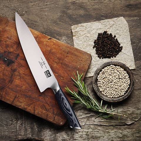 SHAN ZU knife in action on fresh vegetables in kitchen