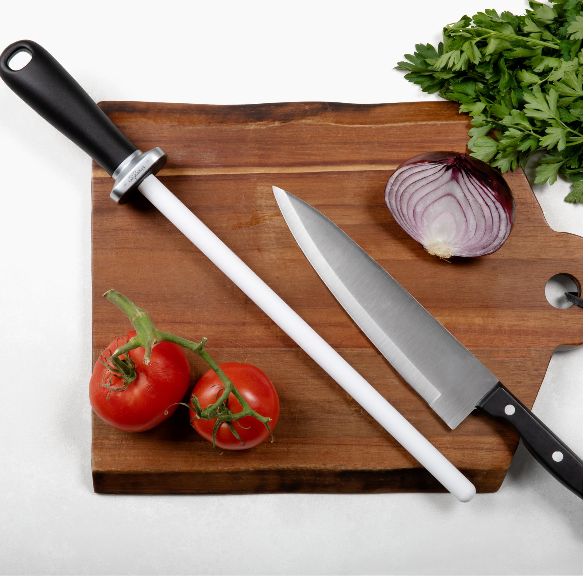 Shenzhen Knives white ceramic sharpener in use with kitchen knives
