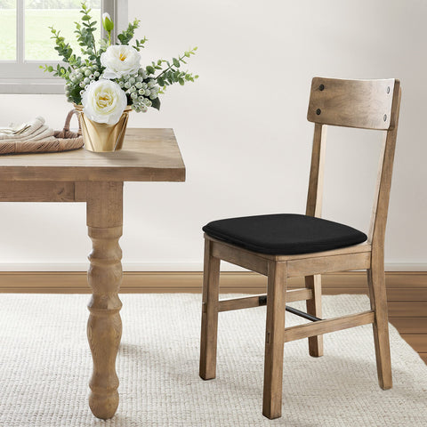 Shinnwa dining chair cushions in black add sleek style to any chair.