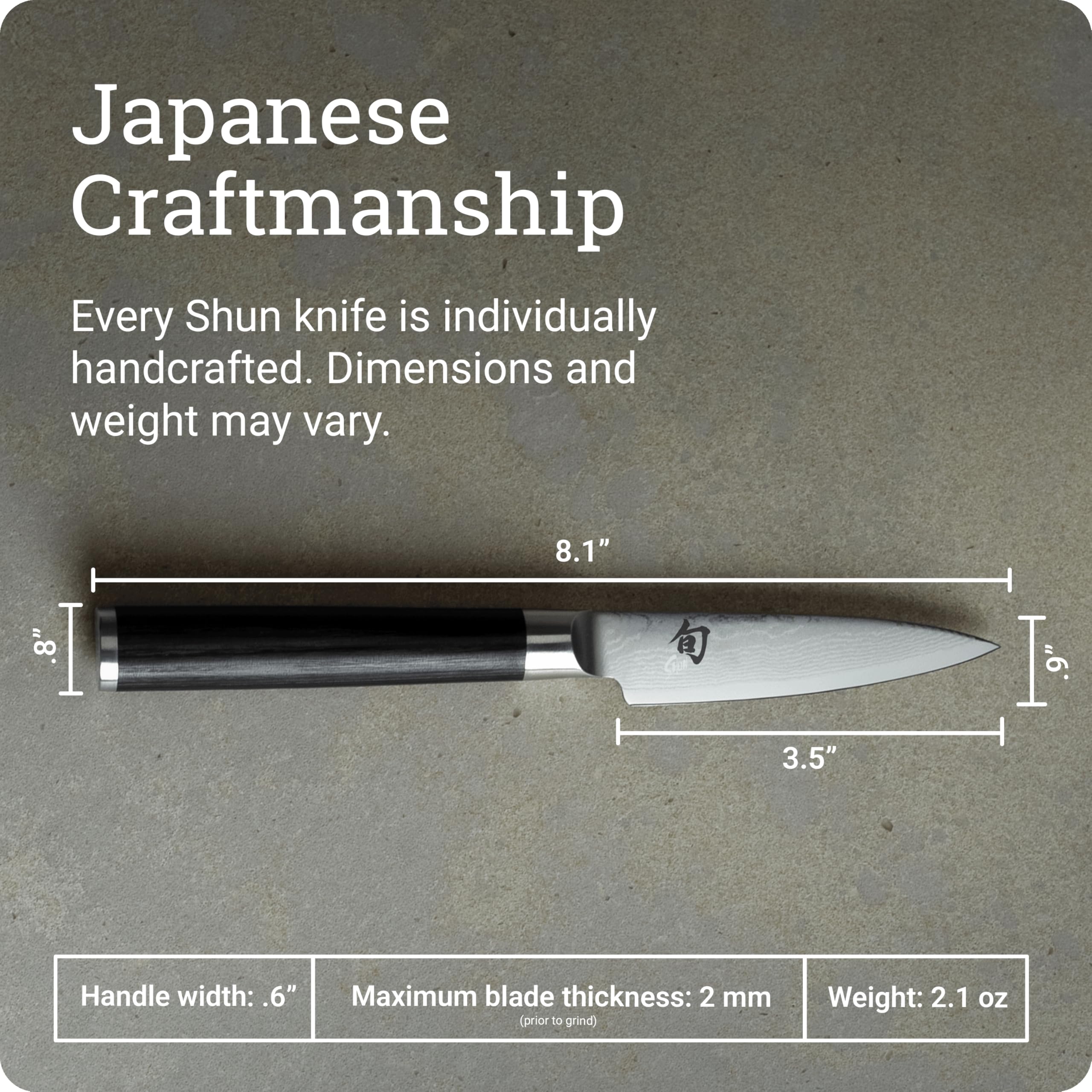 Damascus cladding detail on Shun Classic paring knife blade.