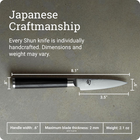 Damascus cladding detail on Shun Classic paring knife blade.