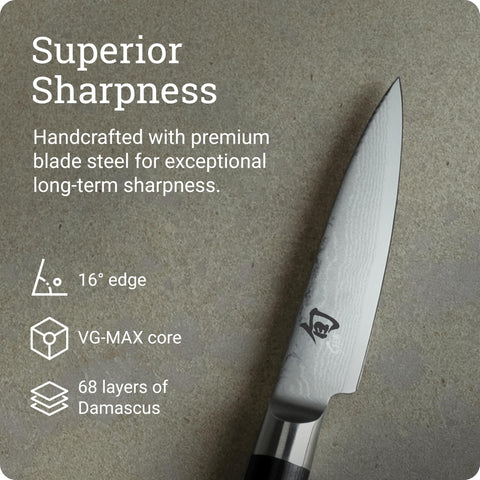 Shun Classic paring knife performing a peeling action on fruit.