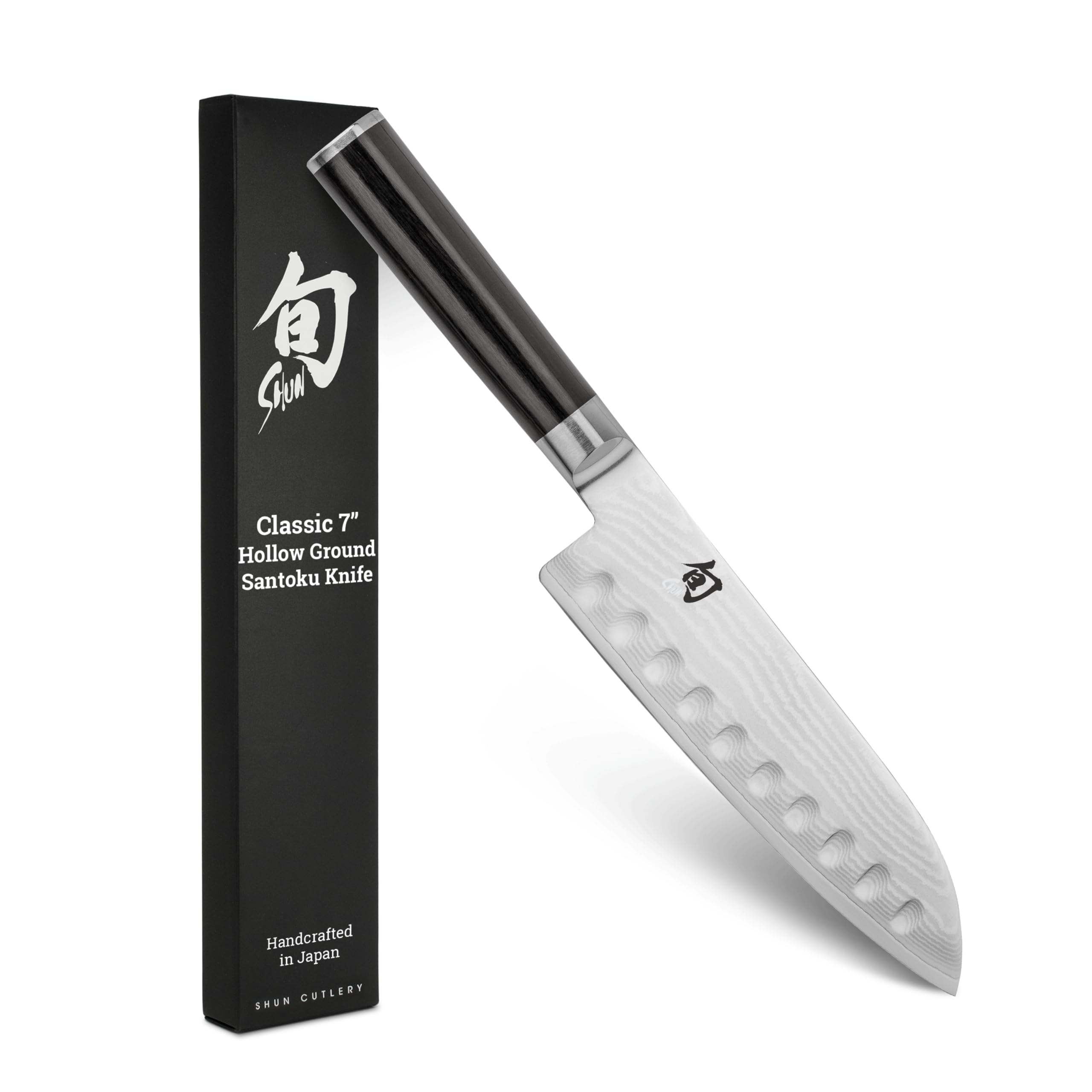 Shun Classic 7-inch hollow-ground Santoku blade ready for precise slicing and reduced sticking