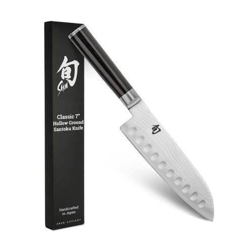 Shun Classic 7-inch hollow-ground Santoku blade ready for precise slicing and reduced sticking