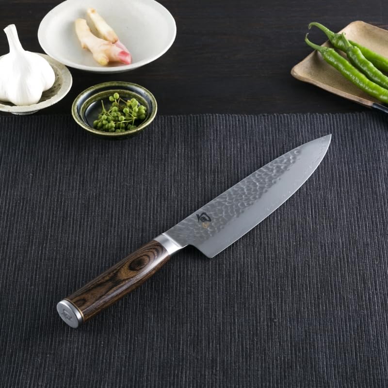 Shun Premier knife wide blade showcases knuckle clearance for safer, comfortable prep.