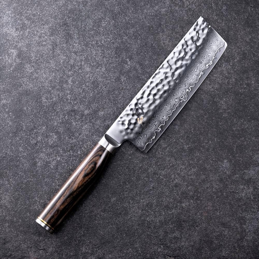 Shun Premier Nakiri hammered tsuchime finish reduces drag and sticking.