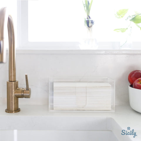 Sicily countertop napkin holder for kitchen and bath with protective base pads.