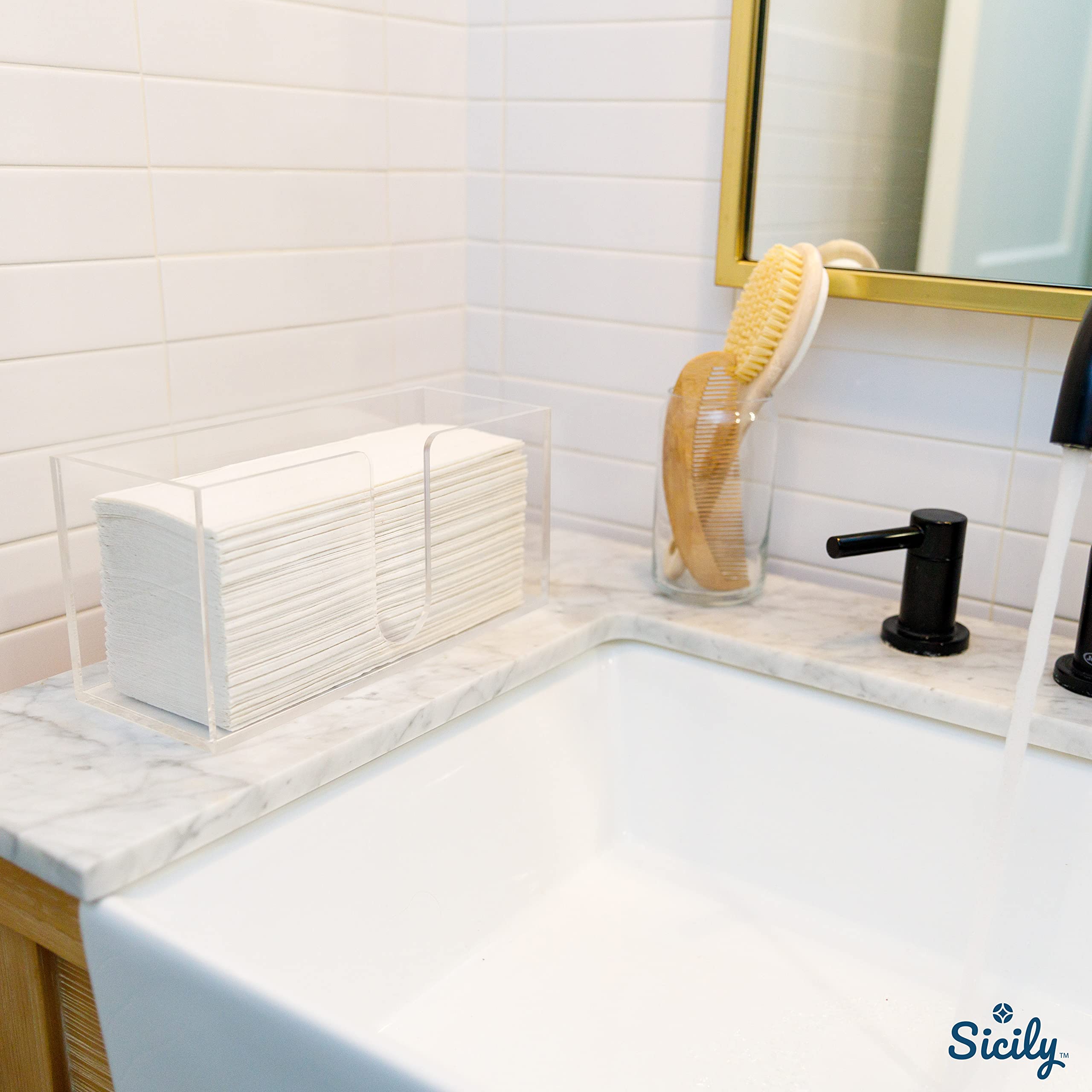 Sicily paper towel dispenser in use on a countertop for quick towel access.