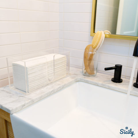Sicily paper towel dispenser in use on a countertop for quick towel access.