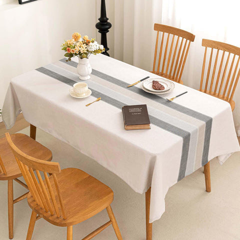 SIELUNO tablecloth shows embroidered stripes and plaid for rustic charm.