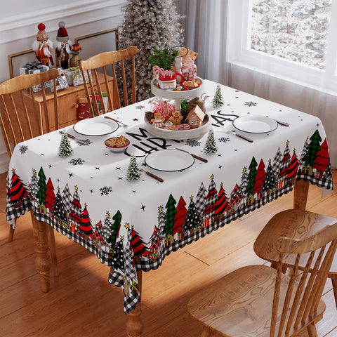 Siilues scalloped-edge tablecloth elevates holiday dining setup.