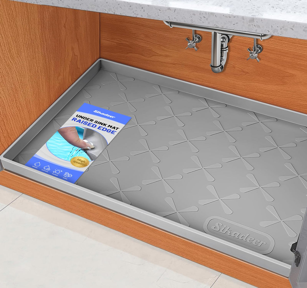 SIKADEER under-sink mat with raised edges protects cabinets from spills.