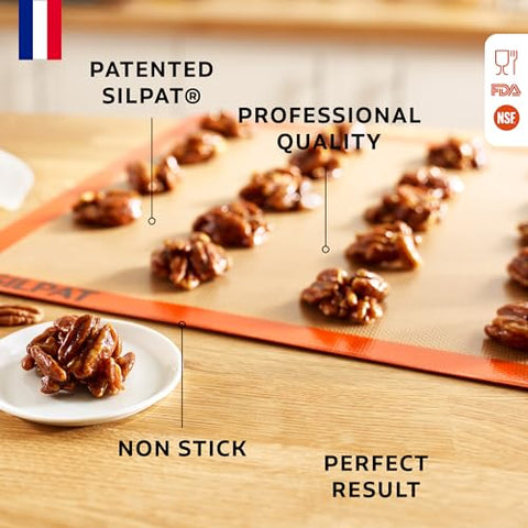 Silpat mat on a pan with gooey dough, preventing sticking and mess.