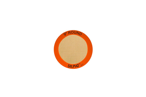 Silpat original round baking mat with a non-stick surface for easy cake release.