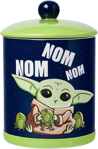 Silver Buffalo Baby Yoda Nom Nom cookie jar with Grogu design for cookies on display at home.