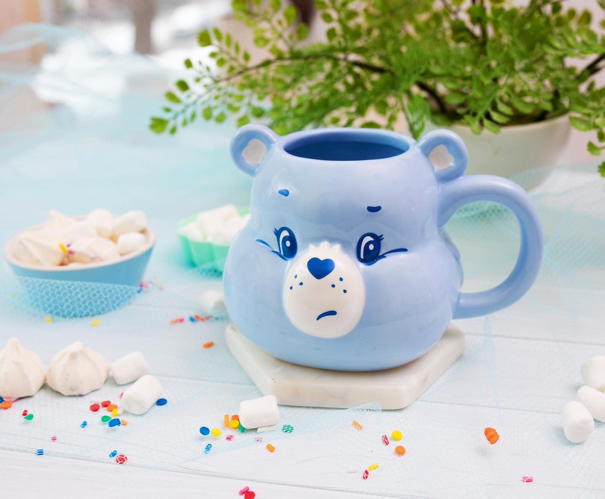 Silver Buffalo blue Care Bears mug for tea breaks and warmth.