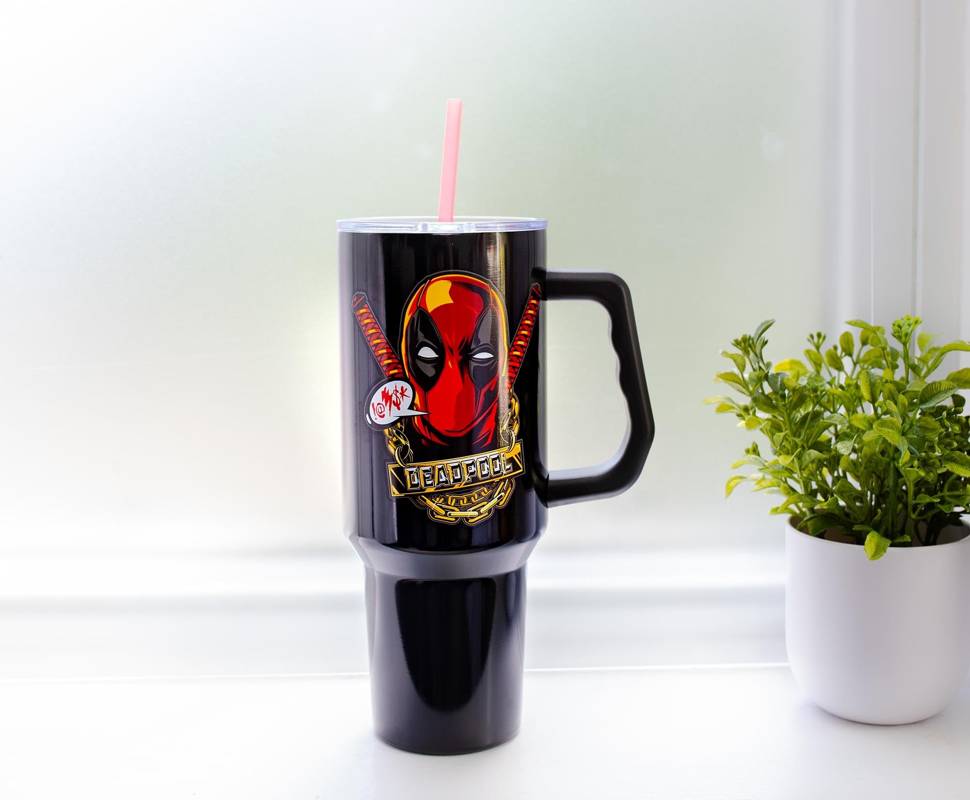 Silver Buffalo Deadpool tumbler censored speech bubble design adds character.