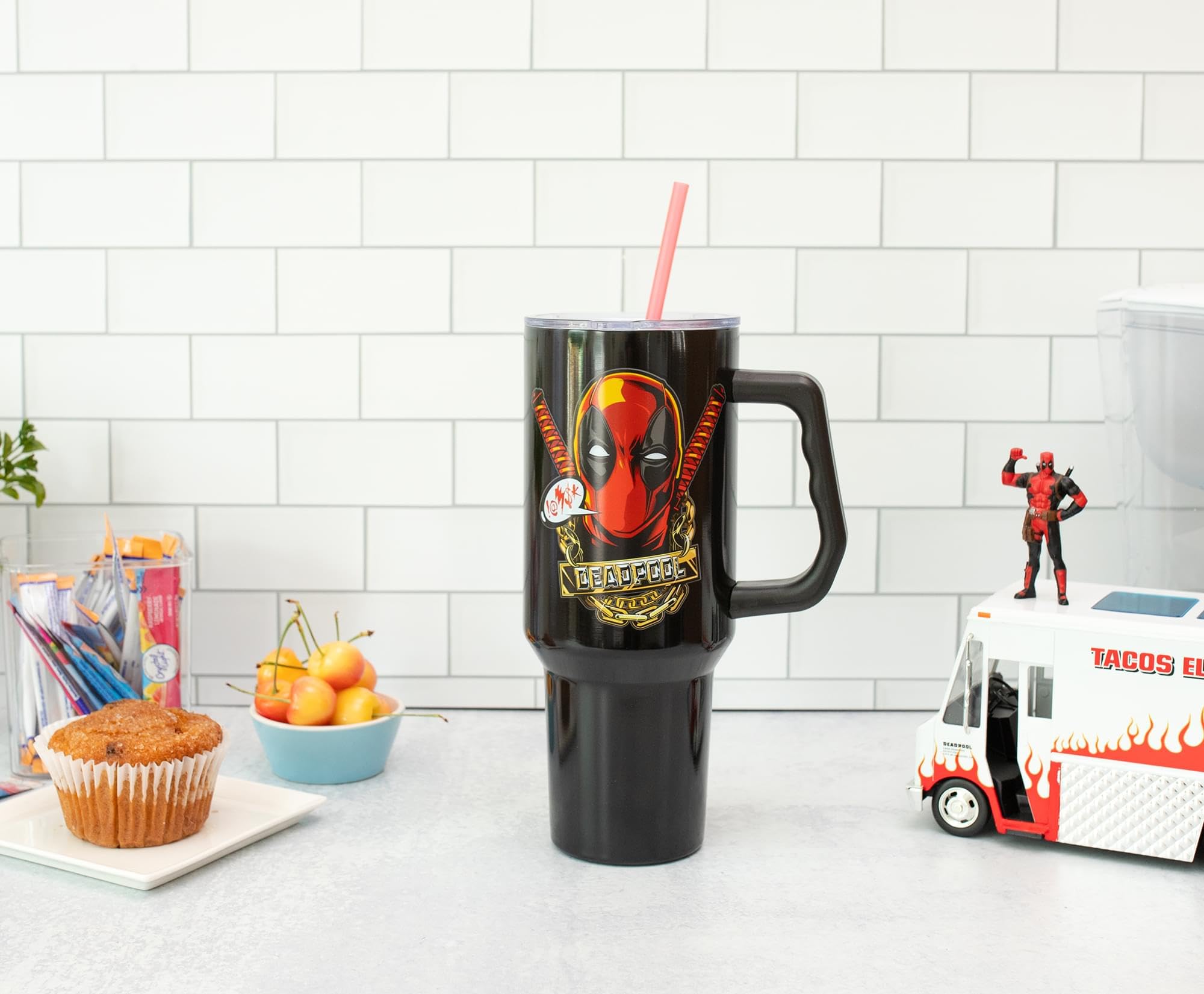 Silver Buffalo Deadpool tumbler red straw detail supports easy sipping.