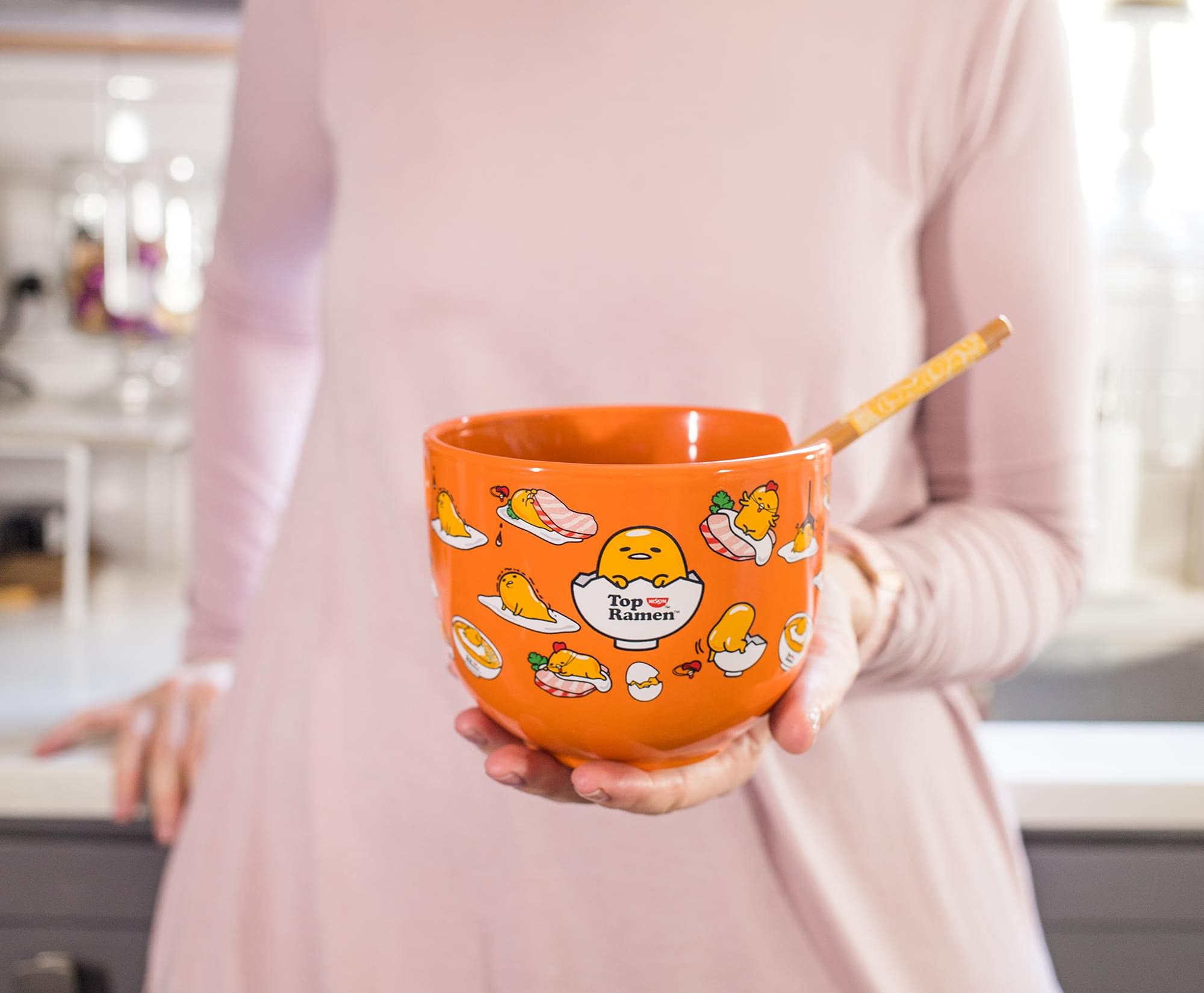 Gudetama built-in chopstick holder helps keep utensils tidy.