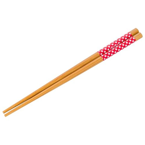 Silver Buffalo Hello Kitty chopsticks with red white polka dots.