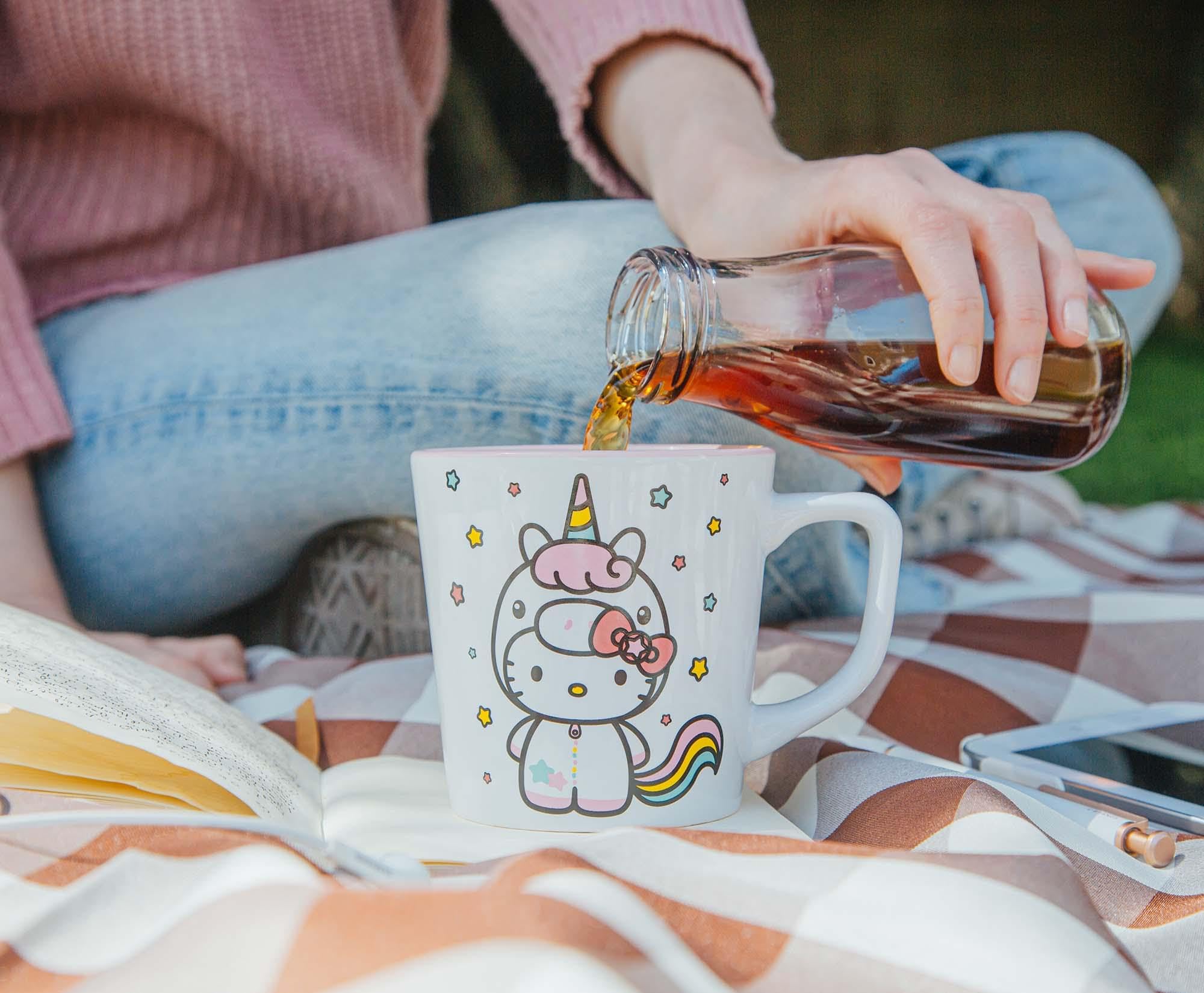 Silver Buffalo Hello Kitty Unicorn mug on a cozy table displaying whimsy and charm.