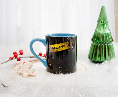 Silver Buffalo holiday cozy mug suitable for desk or kitchen decor.