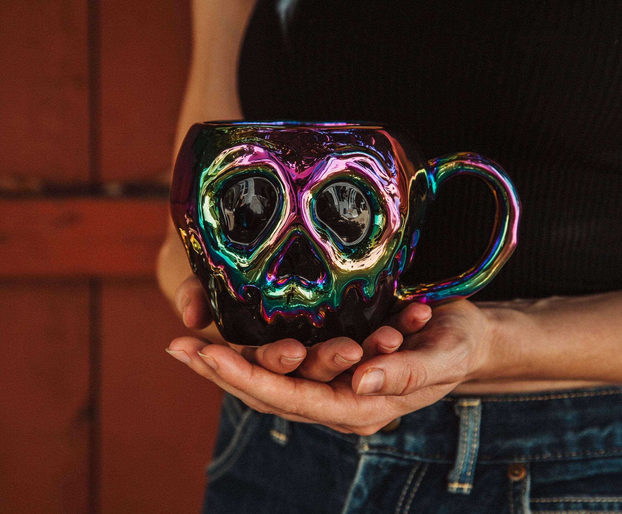 Silver Buffalo 3D poison apple mug with skull accent and iridescent glow.