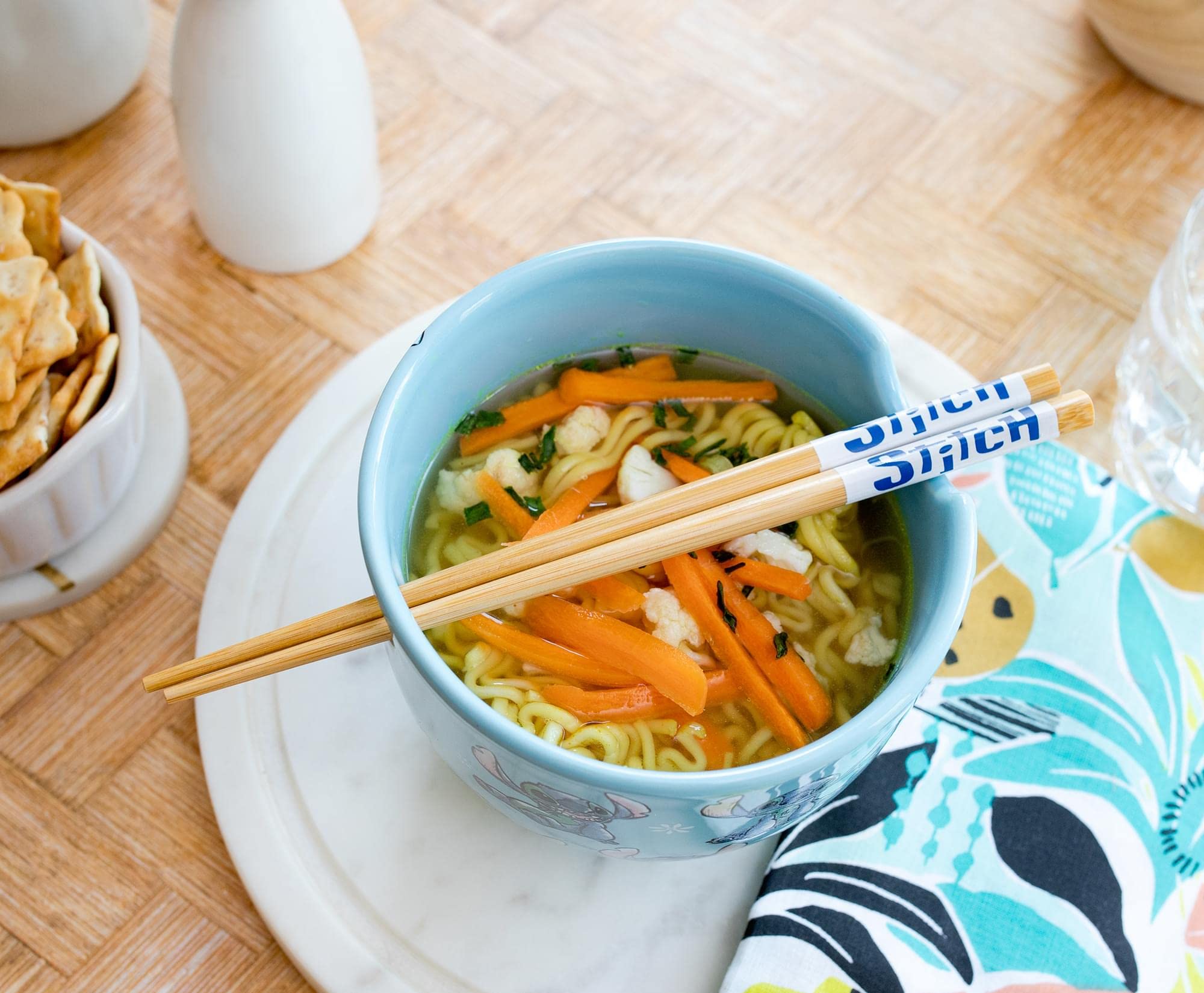 Silver Buffalo Lilo & Stitch chopstick rest built into the bowl for tidy storage