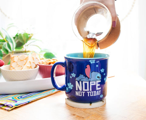 Silver Buffalo Lilo Stitch mug enhances desk decor while enjoying a beverage