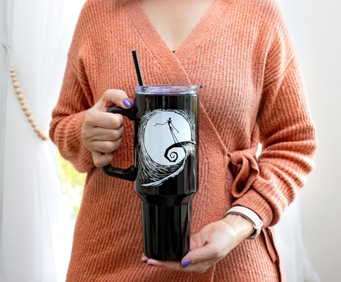 Silver Buffalo tumbler fits standard cup holders for easy travel.