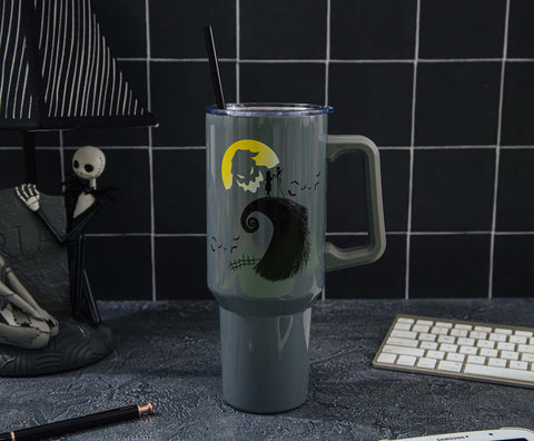 Silver Buffalo Nightmare tumbler showcases bat motif against night sky for enthusiasts.