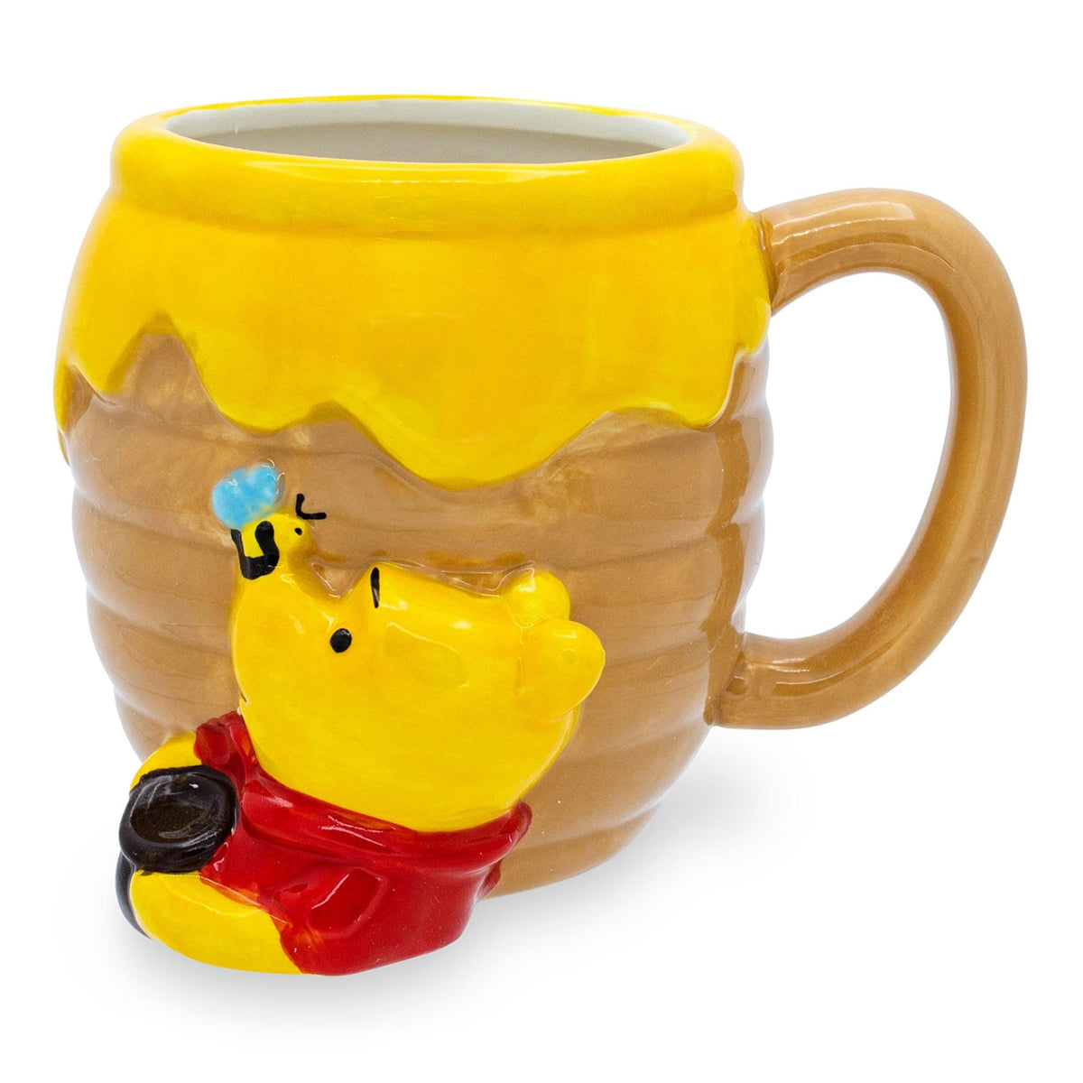 Silver Buffalo Winnie the Pooh Hunny Pot mug with 3D honey pot design for display.