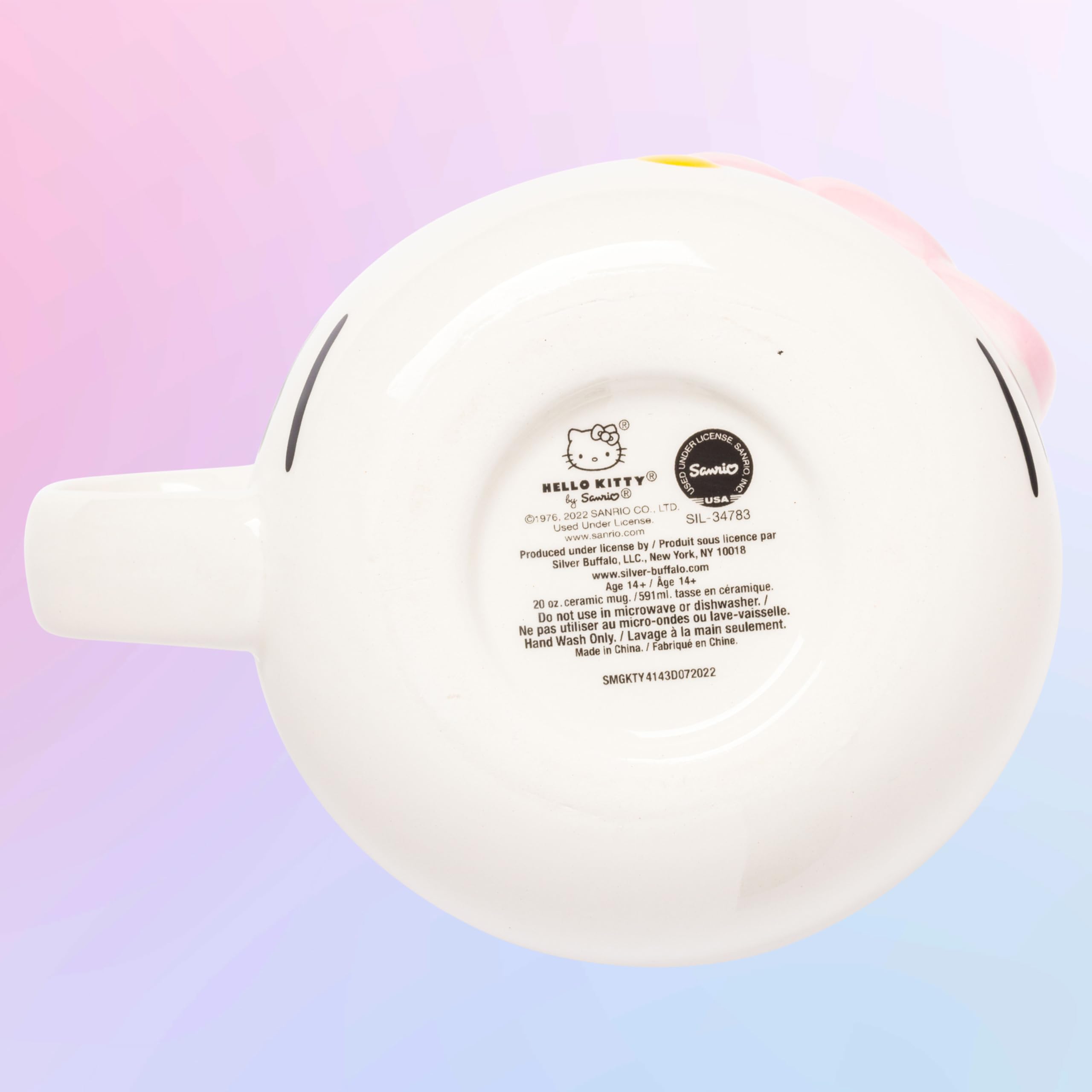 Silver Buffalo pink bow mug, cute kitchen accessory for fans.