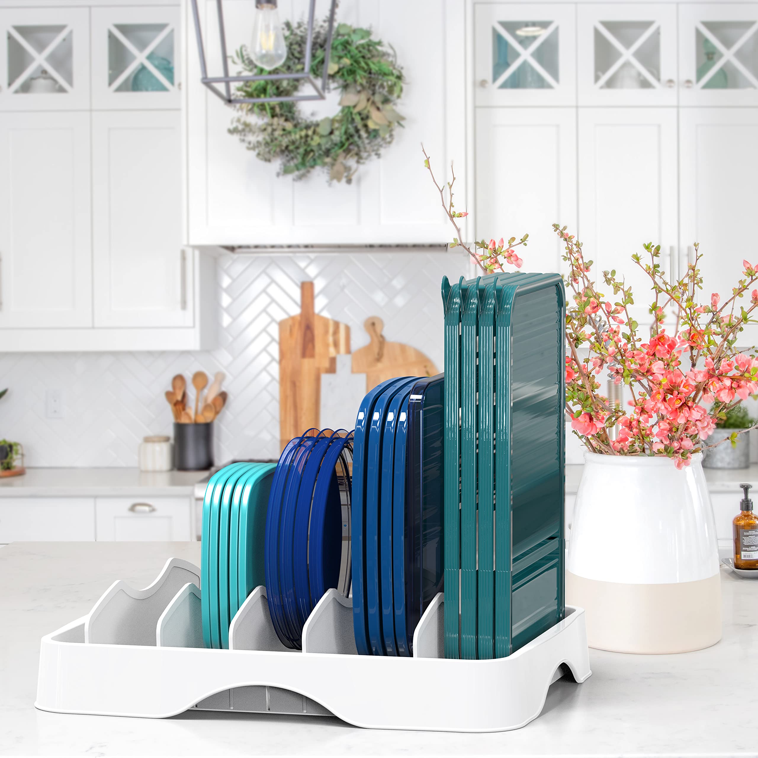 Simple Houseware adjustable dividers highlight five sections for organized lids.