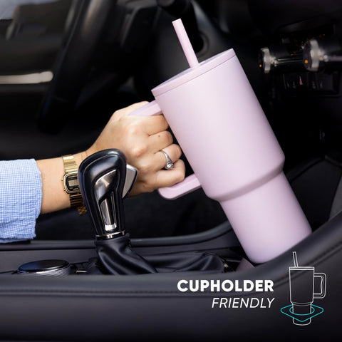 Simple Modern Trek tumbler ergonomic handle in use for easy lifting.
