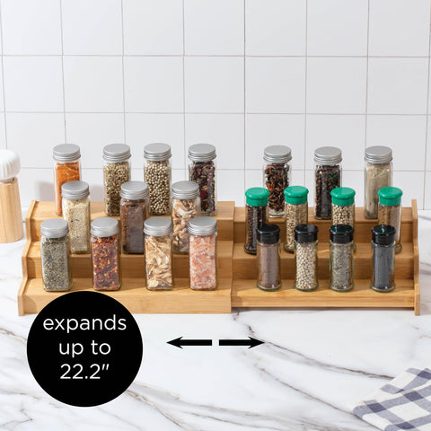 SIMPLEMADE bamboo spice rack on kitchen counter with deep shelves.