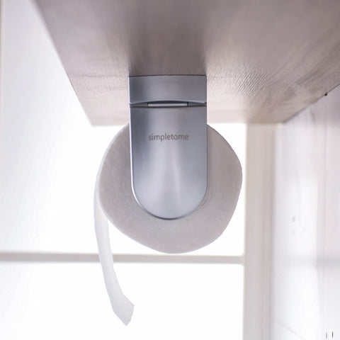 under-cabinet towel holder keeps counters tidy and accessible