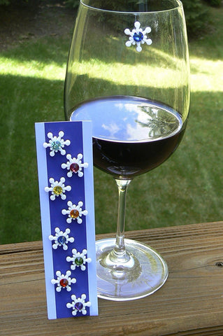 Simply Charmed magnetic wine charms on glass add festive snowflake style to any party.