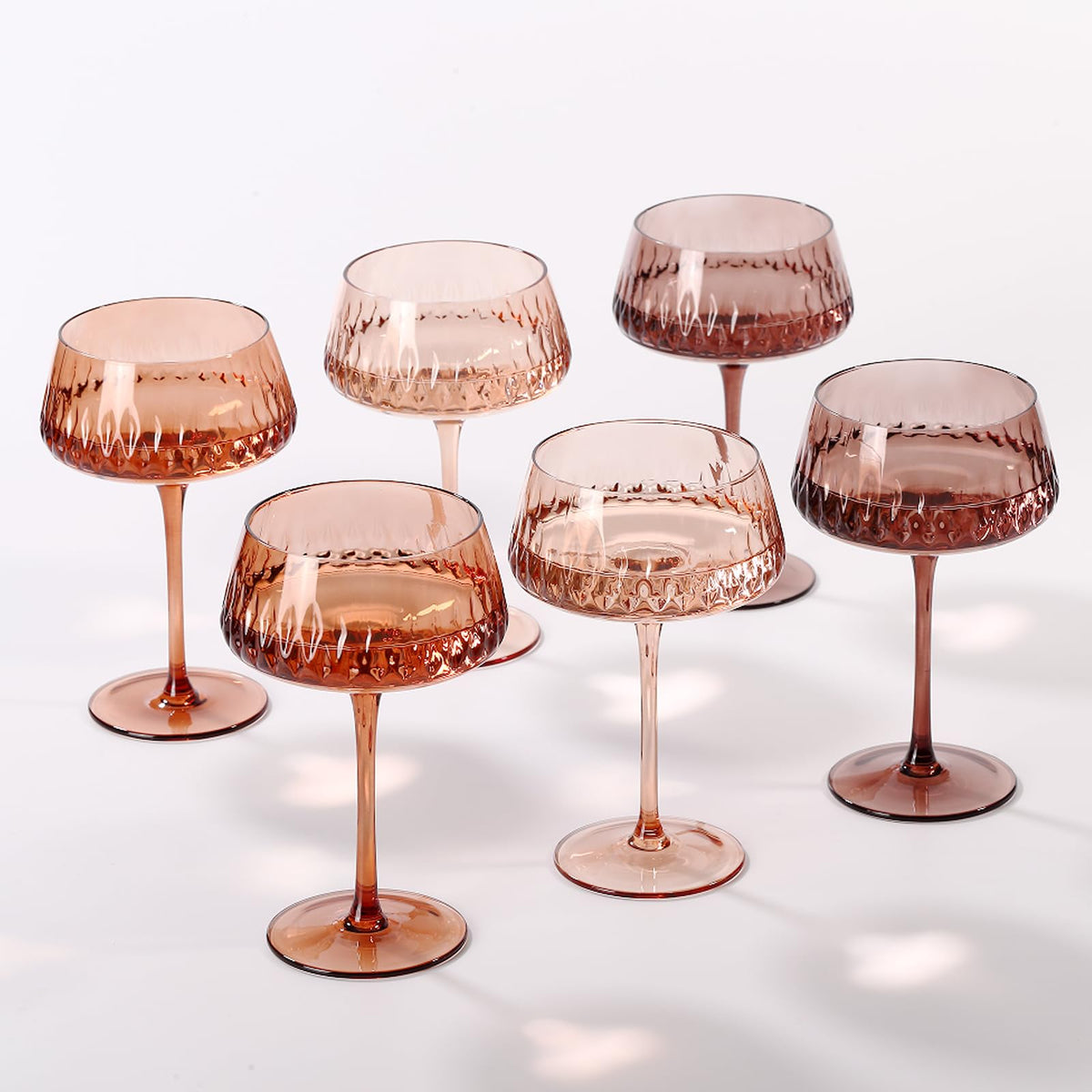 SIPBYSOP Venus Coupe amber diamond glass enhances vibrant cocktails and presentation.
