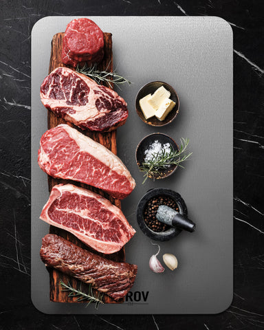 Sirov titanium cutting board in a kitchen setup highlighting durability.