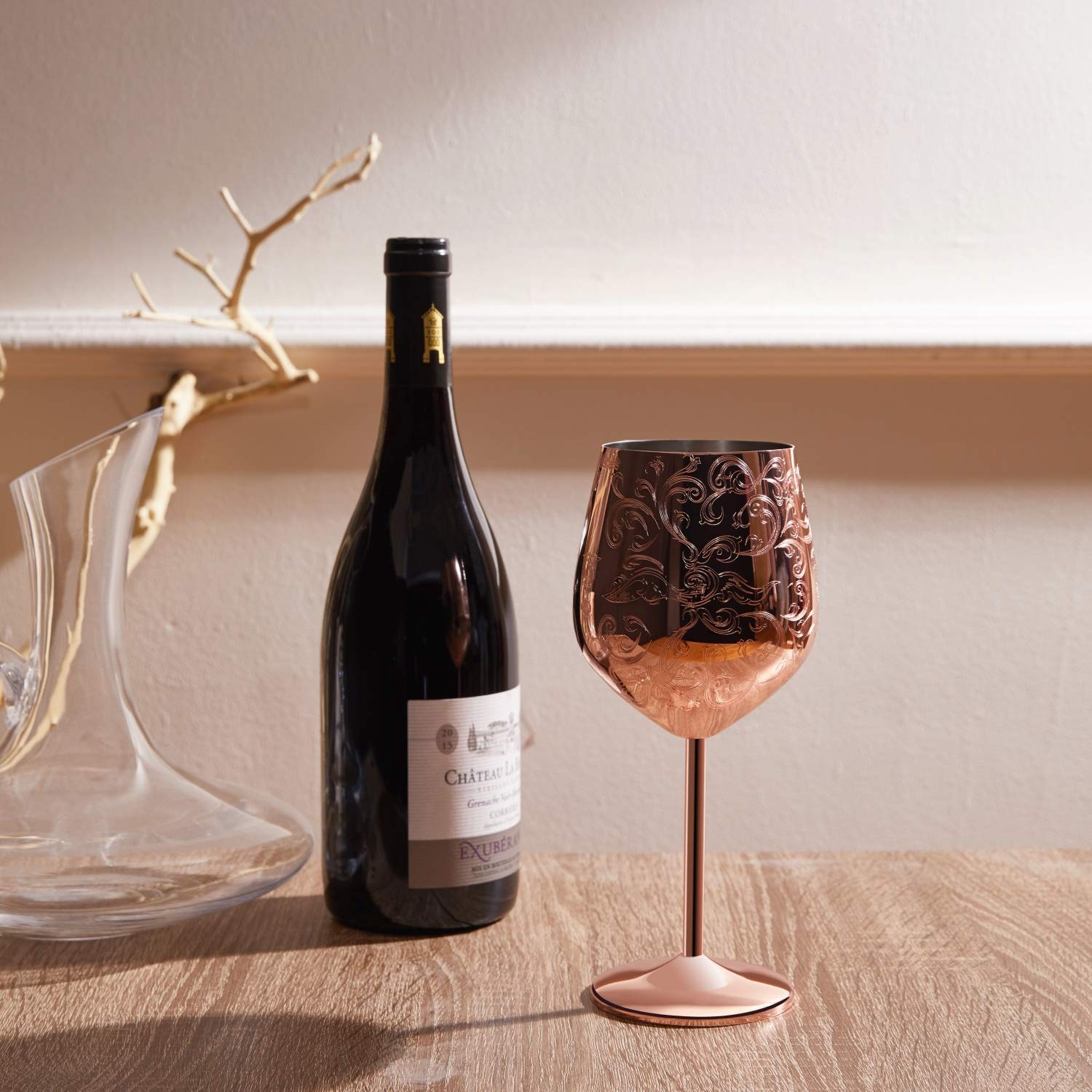 Sky Fish goblet close-up highlights baroque engraving for refined table presence.