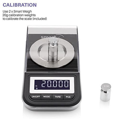 Smart Weigh includes calibration weights and tweezers for accurate setup.