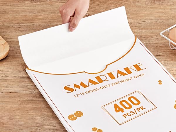 SMARTAKE non-stick parchment with silicone coating for easy food release.