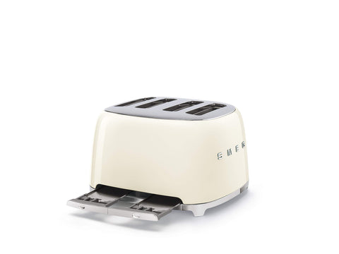 Smeg 50s Style Cream Toaster removable crumb tray simplifies cleanup.