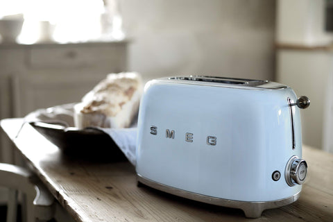 Smeg TSF01PBUS two-wide-slots enable versatile bread sizes with even browning.